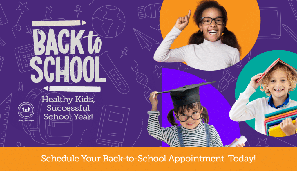 Children receiving back-to-school pediatric services in Huntsville clinic.