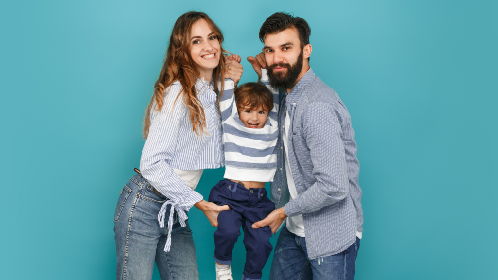 Happy Family of three in a blue background